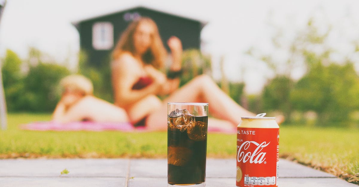 Can we travel with a faulty Malaysian visa? - Coca-cola Can and Drinking Glass Filled With Coke Can we travel with a faulty Malaysian visa? - Coca-cola Can and Drinking Glass Filled With Coke