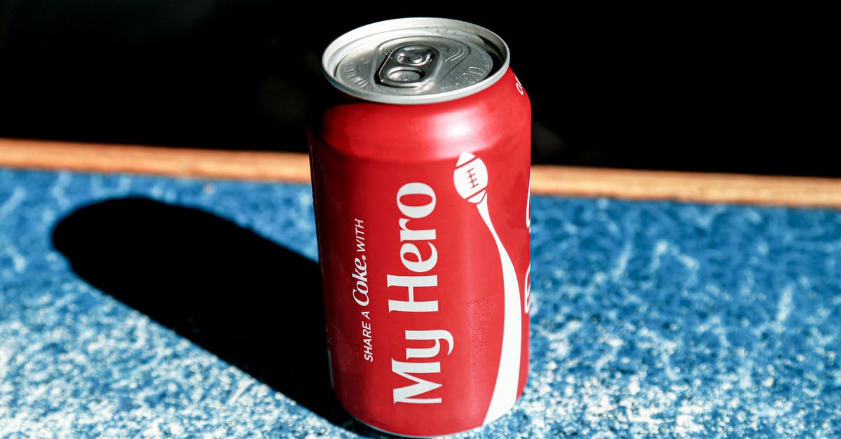 Can you freeze liquids to pass security checks? - From above of red metal can with refreshing fizzing coke placed on table in cafe Can you freeze liquids to pass security checks? - From above of red metal can with refreshing fizzing coke placed on table in cafe