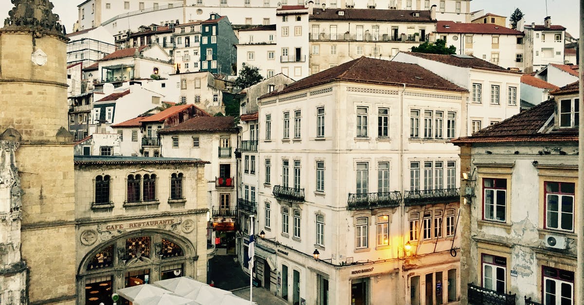 Can you travel to Portugal with a new passport and the visa in the old passport? - Historic district of beautiful city with aged buildings and monastery Can you travel to Portugal with a new passport and the visa in the old passport? - Historic district of beautiful city with aged buildings and monastery