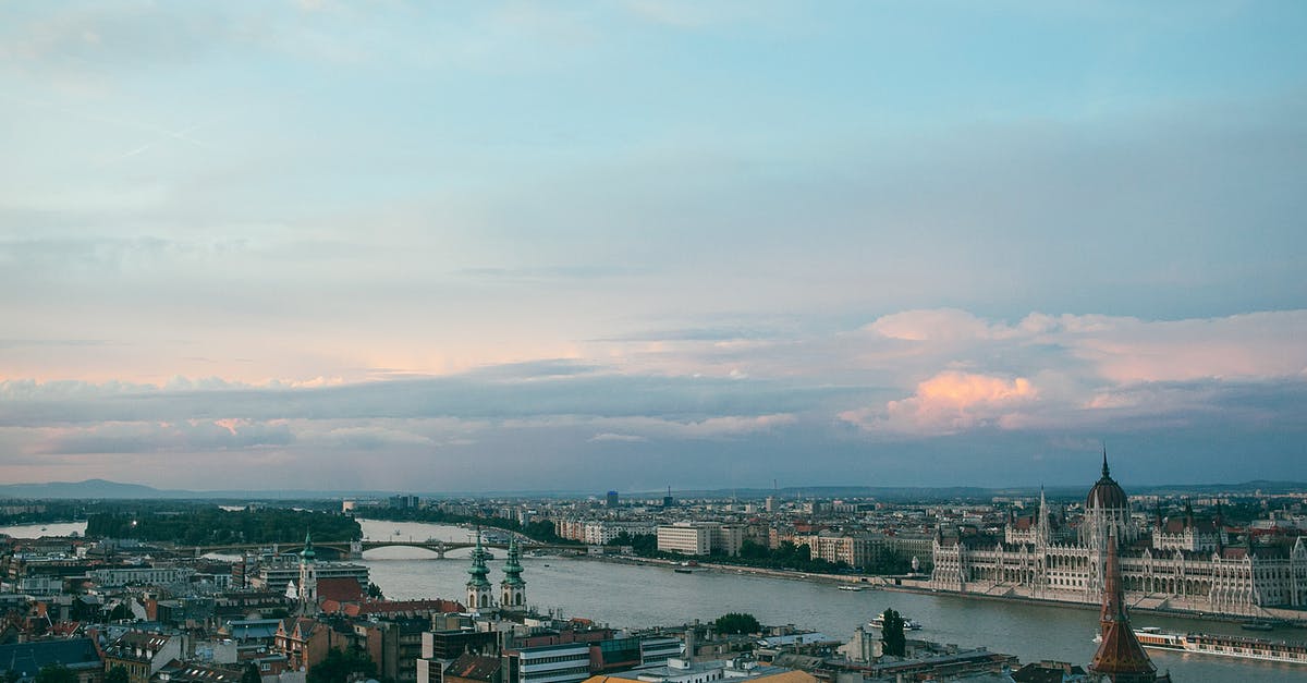 Can you visit Parliament House in Brisbane? (the Queensland Parliament) - Bridge and river between aged masonry house and church exteriors in Budapest in evening Can you visit Parliament House in Brisbane? (the Queensland Parliament) - Bridge and river between aged masonry house and church exteriors in Budapest in evening
