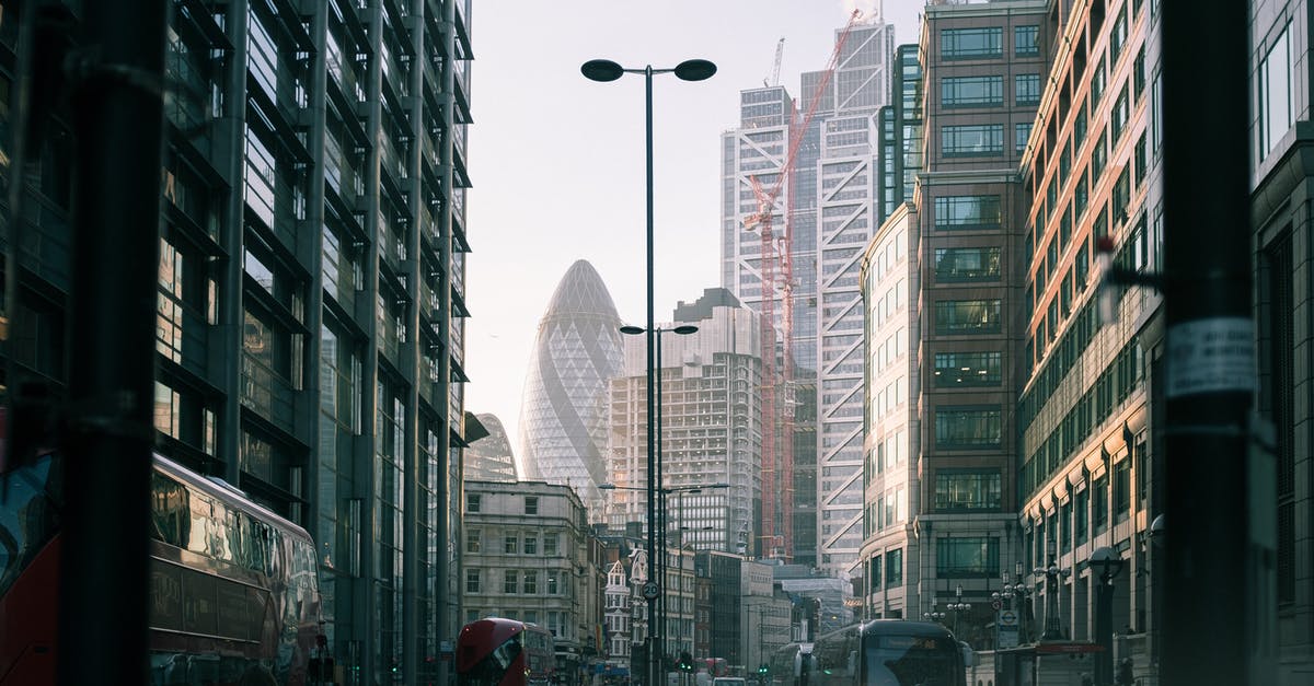 Canadian SME working in UK for 2 weeks - Buses and Cars on Busy Road Canadian SME working in UK for 2 weeks - Buses and Cars on Busy Road