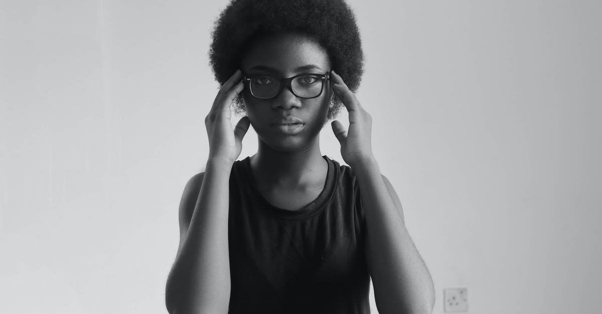 Canker sores after visiting Nigeria - Monochrome Photo Of Woman Wearing Eyeglasses Canker sores after visiting Nigeria - Monochrome Photo Of Woman Wearing Eyeglasses