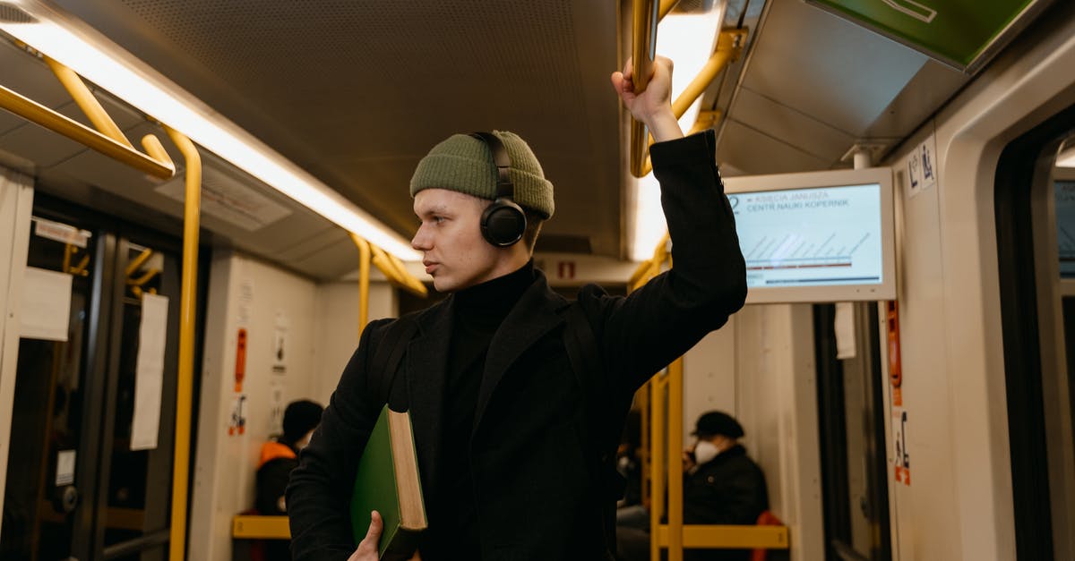 Cannot book train from Budapest to Bucharest -
A Man Listening to Music while Riding a Train Cannot book train from Budapest to Bucharest -
A Man Listening to Music while Riding a Train