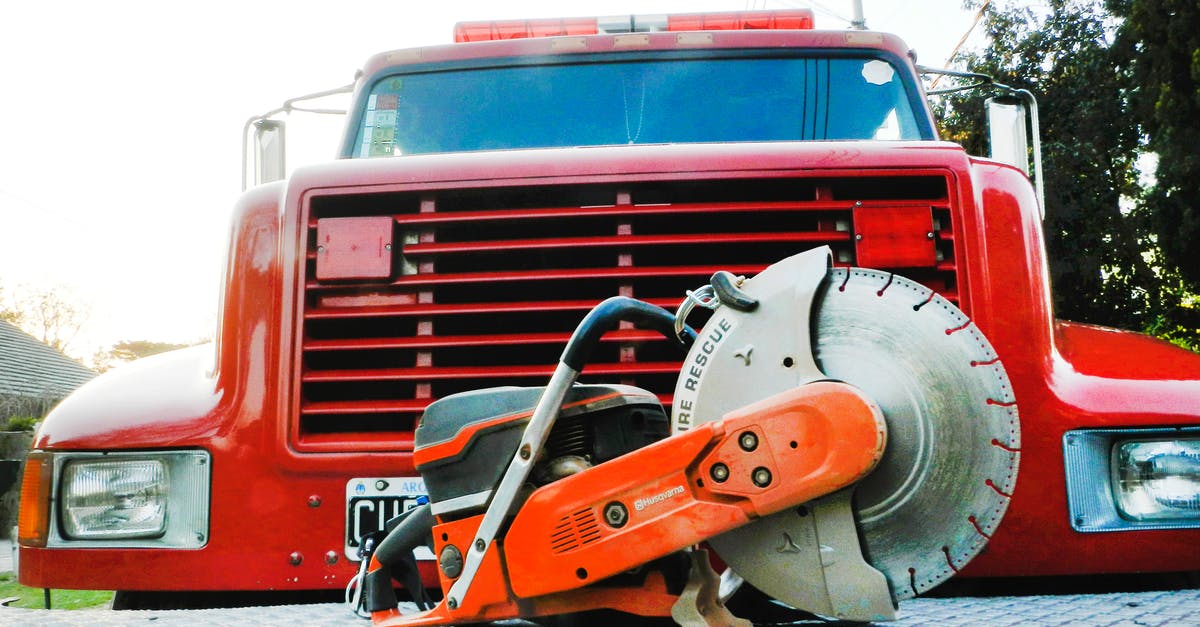 Car hire in Austria with ski equipment - Red Vintage Truck on Snow Covered Ground Car hire in Austria with ski equipment - Red Vintage Truck on Snow Covered Ground