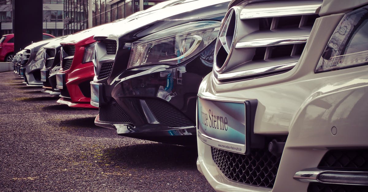 Car rental in Scotland - Mercedes Benz Parked in a Row