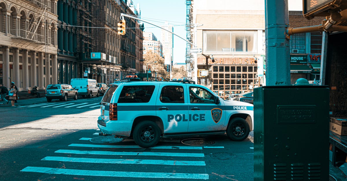 Car rentals cross-border between USA & Canada - White Police Car Car rentals cross-border between USA & Canada - White Police Car