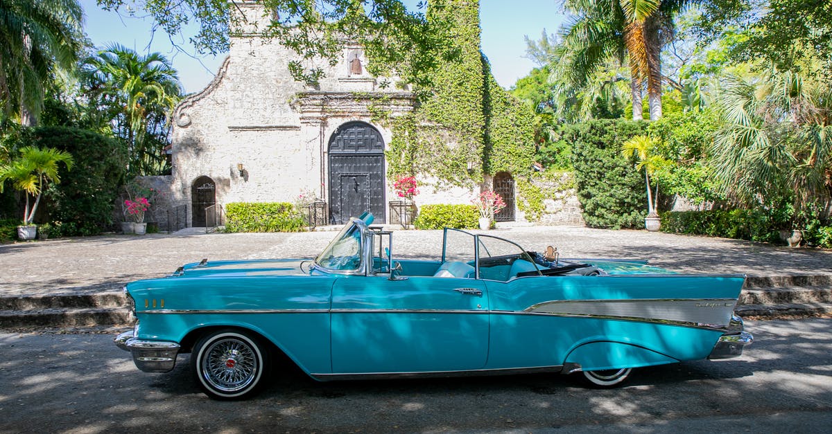 Caribbean Travel from Miami to Nassau to Santiago de Cuba - Blue Vintage Car Parked Beside Green Trees Caribbean Travel from Miami to Nassau to Santiago de Cuba - Blue Vintage Car Parked Beside Green Trees