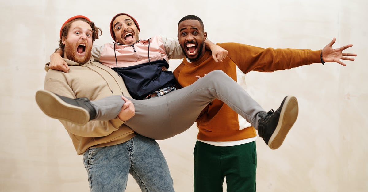 Carrying a handgun in other countries with a US concealed carry permit - Multiracial Men in a Fun Photoshoot Carrying a handgun in other countries with a US concealed carry permit - Multiracial Men in a Fun Photoshoot