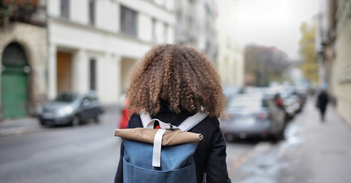 Carrying hard drives in checked in luggage - Woman in Black Coat Carrying Backpack Carrying hard drives in checked in luggage - Woman in Black Coat Carrying Backpack