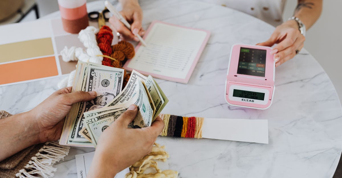 Cash limit counting in traveling to US - Hands Holding US Dollar Bills Cash limit counting in traveling to US - Hands Holding US Dollar Bills