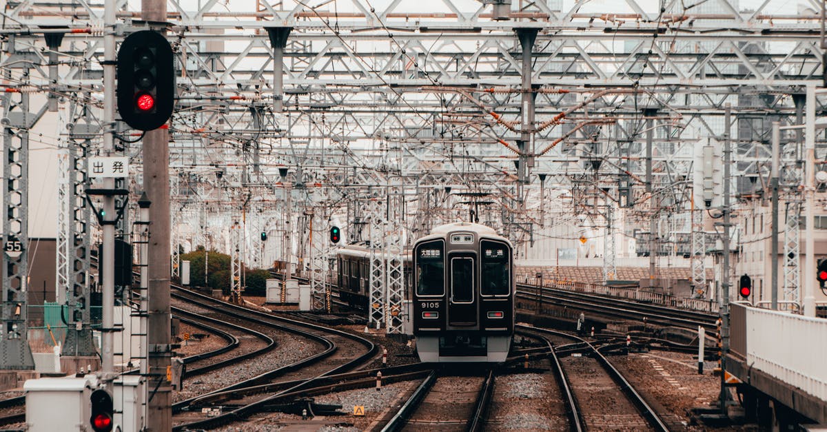 Cassiopeia Sleeper Train Japan - Tours? - Black and Gray Train on Rail Tracks Cassiopeia Sleeper Train Japan - Tours? - Black and Gray Train on Rail Tracks