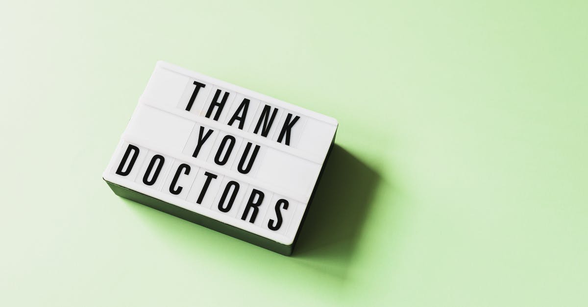 Change Boarding Point of a CKWL ticket - From above of vintage light box with THANK YOU DOCTORS inscription placed on green surface Change Boarding Point of a CKWL ticket - From above of vintage light box with THANK YOU DOCTORS inscription placed on green surface
