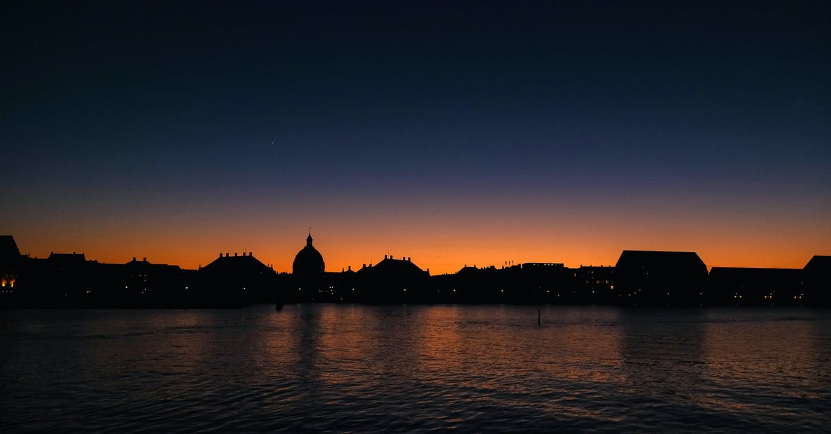 Change flights in Copenhagen in 1 hour with checked baggage? - Silhouette of Buildings Change flights in Copenhagen in 1 hour with checked baggage? - Silhouette of Buildings