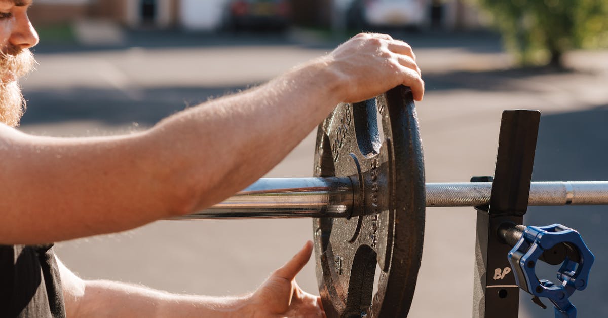 Change trains in Brest (Belarus) under 15 minutes? - Man putting weight on metal barbell Change trains in Brest (Belarus) under 15 minutes? - Man putting weight on metal barbell
