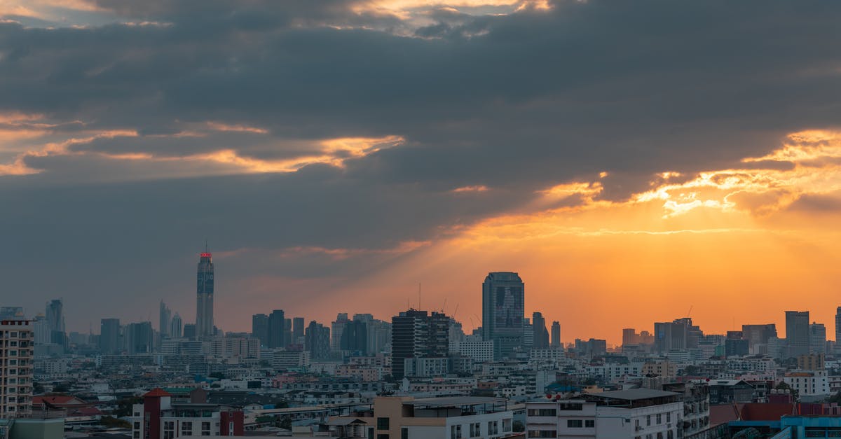 Changing airlines in Bangkok, Thailand in transit from Laos to Colombo, Sri Lanka - City Skyline Under Cloudy Sky during Sunset Changing airlines in Bangkok, Thailand in transit from Laos to Colombo, Sri Lanka - City Skyline Under Cloudy Sky during Sunset