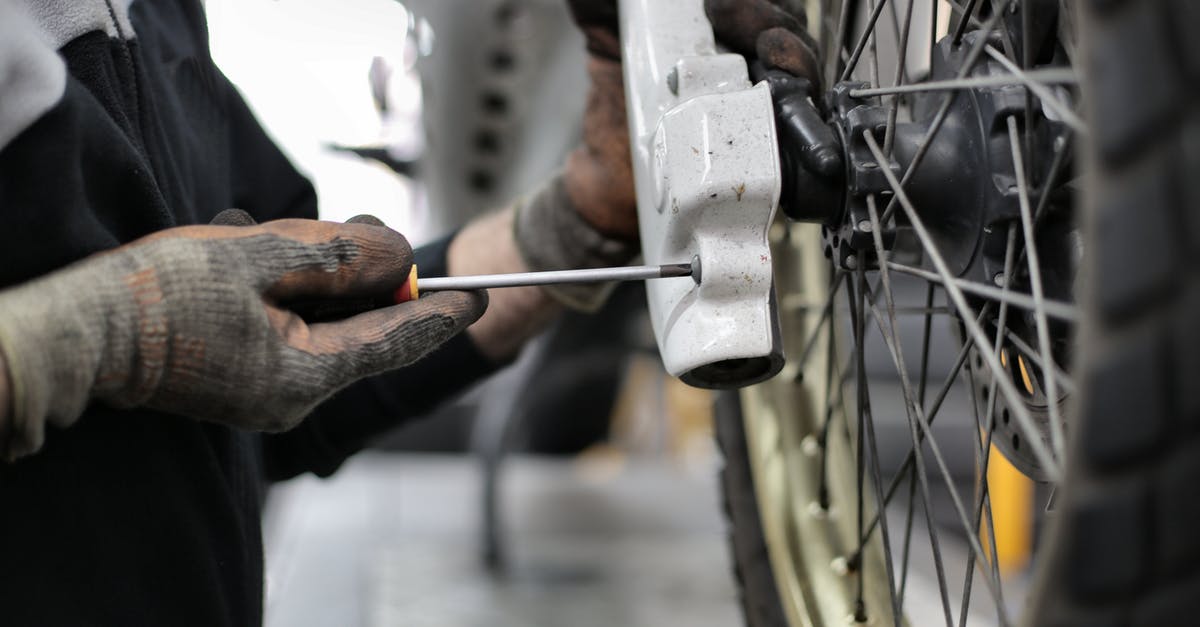 Changing business flight date [closed] - Person Holding Screwdriver