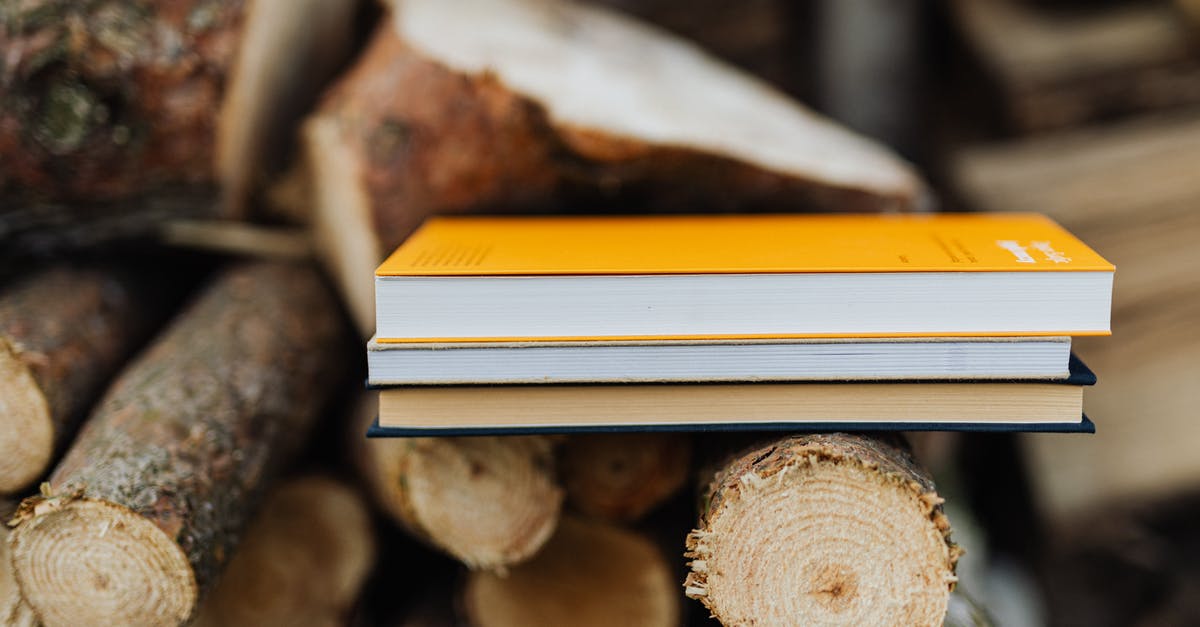 Charged for fuel surcharge after re-booking a flight. Fair? - Books placed on edge of freshly prepared woodpile in backyard of countryside house Charged for fuel surcharge after re-booking a flight. Fair? - Books placed on edge of freshly prepared woodpile in backyard of countryside house