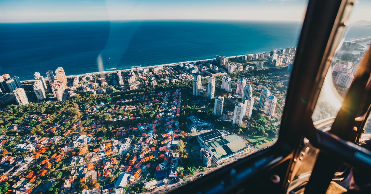 Cheapest flight "from any city" - High-Angle Photo of City Buildings Cheapest flight "from any city" - High-Angle Photo of City Buildings