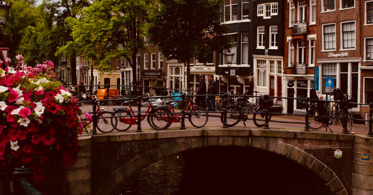 Cheapest option to get a bike for a week Amsterdam - Photo of Bicycles Near Bridge at Daytime Cheapest option to get a bike for a week Amsterdam - Photo of Bicycles Near Bridge at Daytime