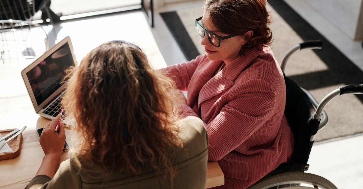 Cheapest place to park for two weeks while working in Boston? - Woman in Red Sweater Wearing Black Framed Eyeglasses Sitting on Wheelchair Cheapest place to park for two weeks while working in Boston? - Woman in Red Sweater Wearing Black Framed Eyeglasses Sitting on Wheelchair