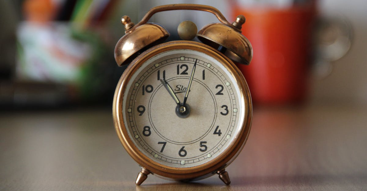 Check-in time for early morning flight from Minneapolis–St Paul - Focus Photography of Brown Double Bell Alarm Clock Check-in time for early morning flight from Minneapolis–St Paul - Focus Photography of Brown Double Bell Alarm Clock