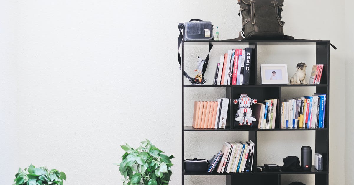 Checking bags through on separate OneWorld bookings? - Books and Speakers on Black Wooden Shelf Checking bags through on separate OneWorld bookings? - Books and Speakers on Black Wooden Shelf