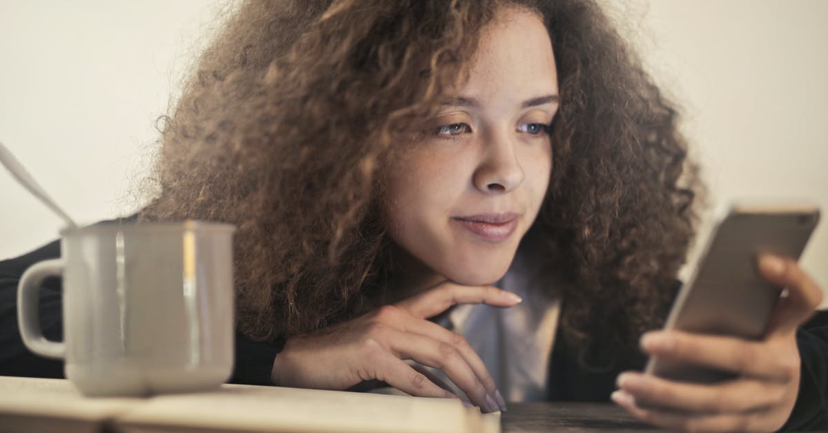 Checking bags through on separate OneWorld bookings? - Woman in Black Shirt Leaning on Brown Wooden Table Checking bags through on separate OneWorld bookings? - Woman in Black Shirt Leaning on Brown Wooden Table