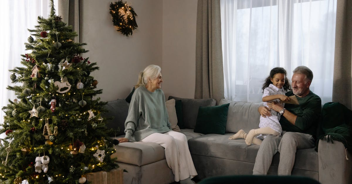 Child age for Virgin Atlantic flights - Woman in Gray Sweater Sitting on Gray Couch Child age for Virgin Atlantic flights - Woman in Gray Sweater Sitting on Gray Couch