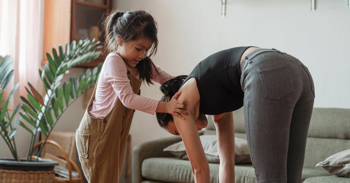 Children free under 5 on UK trains -- any need to prove? - Young flexible ethnic woman with cute daughter during workout together Children free under 5 on UK trains -- any need to prove? - Young flexible ethnic woman with cute daughter during workout together