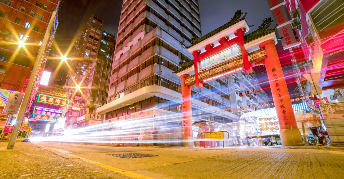 China M visa in HK for non-HK ID holder - Time Lapse Photography Of Vehicles Passing Through China Town