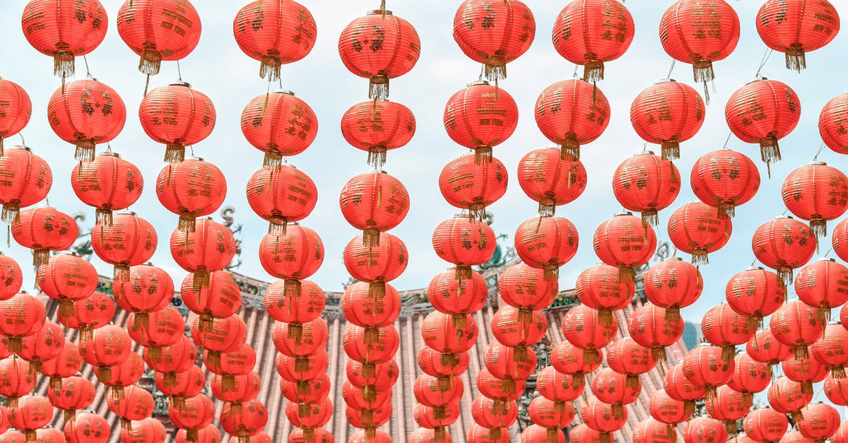 Chinese national with UK permanent residency requires visa to travel to Ireland? - Red Chinese lanterns hanging in rows