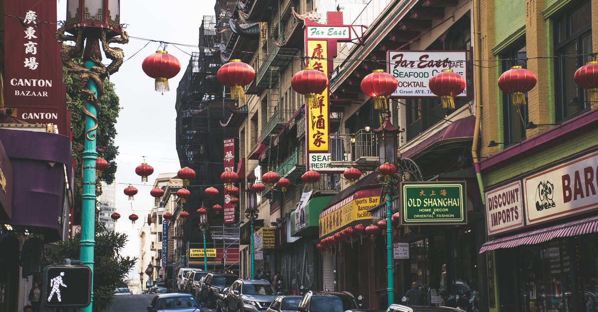 Chinese VISA Q2 10 year - Tourist to Work - Vehicles Parked Beside Buildings Under Red Chinese Lanterns Chinese VISA Q2 10 year - Tourist to Work - Vehicles Parked Beside Buildings Under Red Chinese Lanterns