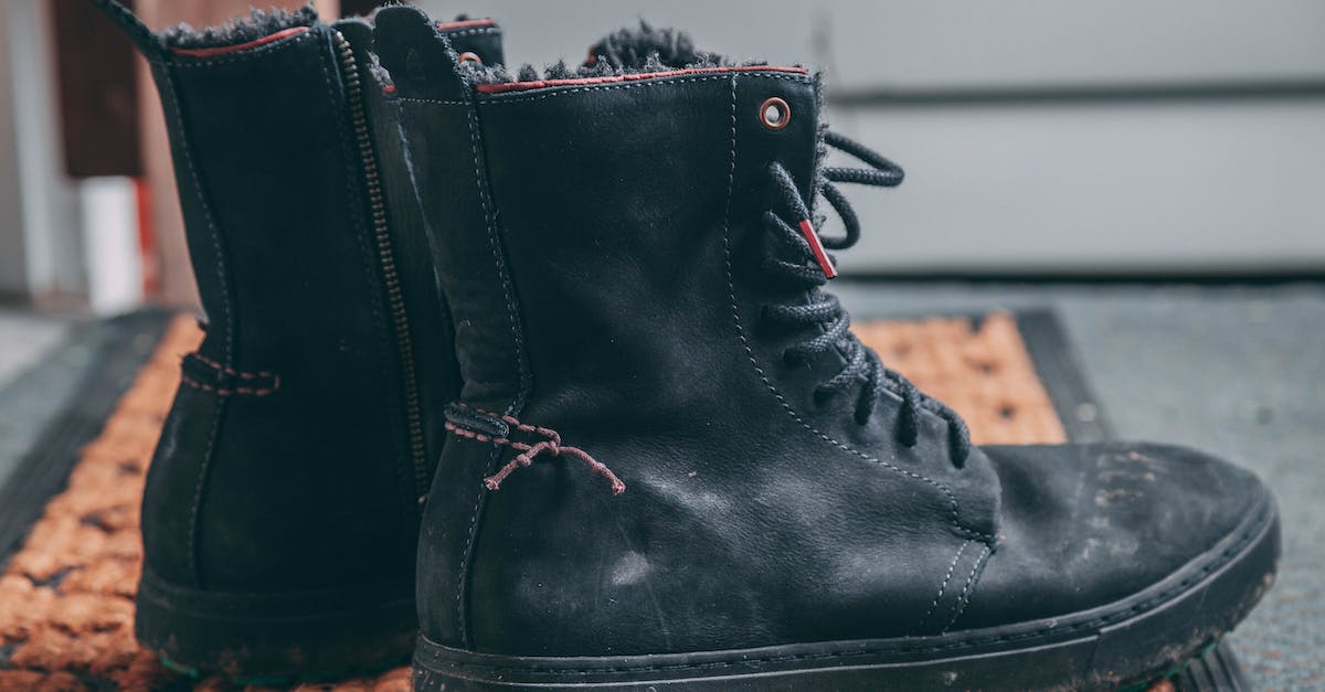 Choosing hiking shoes [closed] - Pair of Black Lace-up Boots on Area Rug