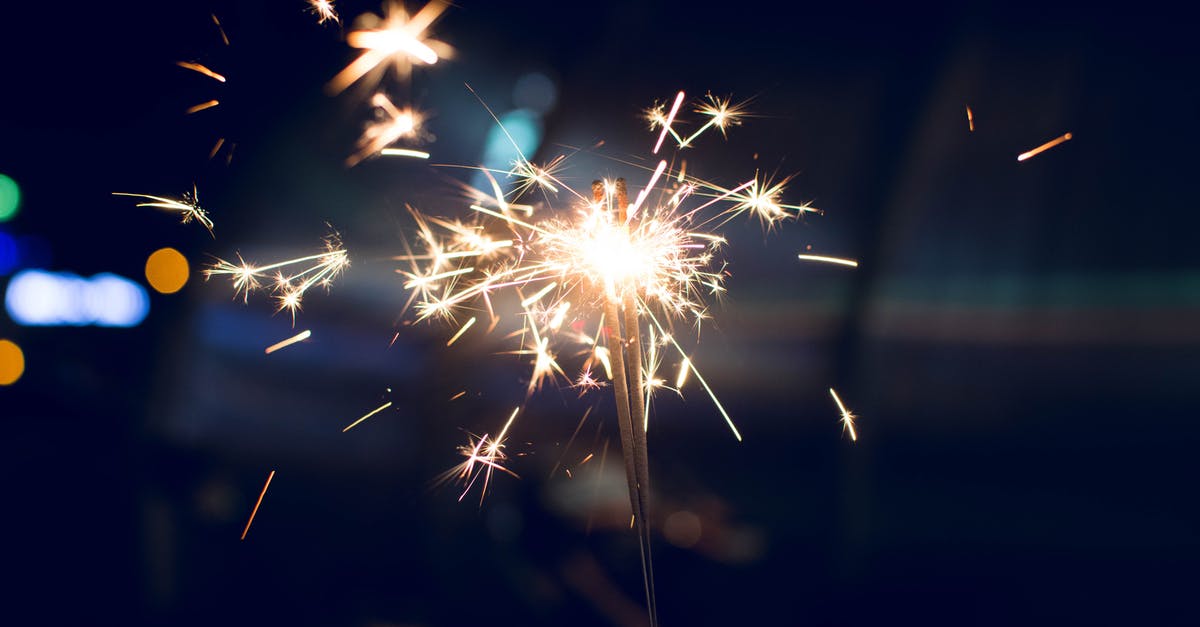 Christmas eve advice for a backpacker thinking of flying in to Germany - Selective Focus Photography of Sparkler Christmas eve advice for a backpacker thinking of flying in to Germany - Selective Focus Photography of Sparkler