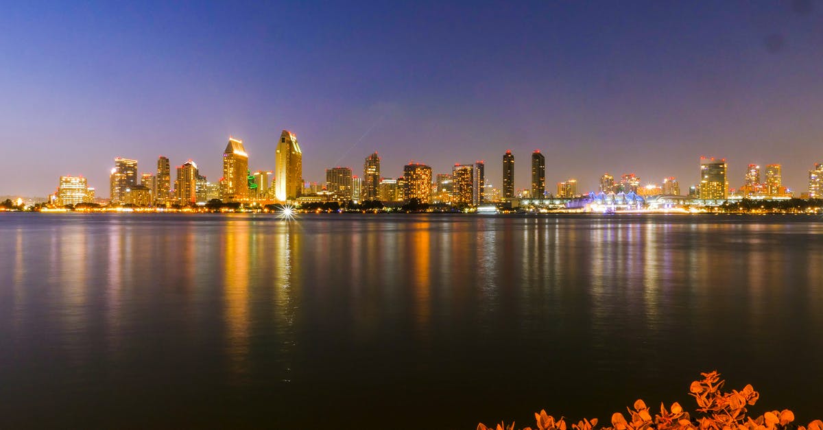 City name too long for USA passport application - City Skyline Across Body of Water During Night Time City name too long for USA passport application - City Skyline Across Body of Water During Night Time