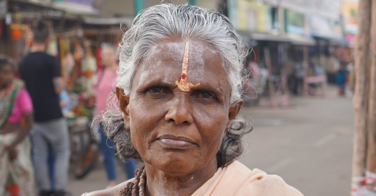 Clarification on Indian visa - Woman in Brown Coat With White and Brown Hair Clarification on Indian visa - Woman in Brown Coat With White and Brown Hair