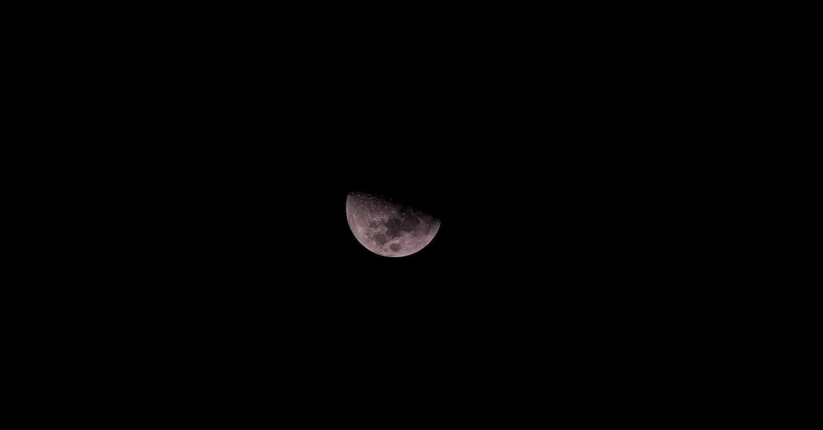 Climate in Peru in September - Half of moon on night sky Climate in Peru in September - Half of moon on night sky