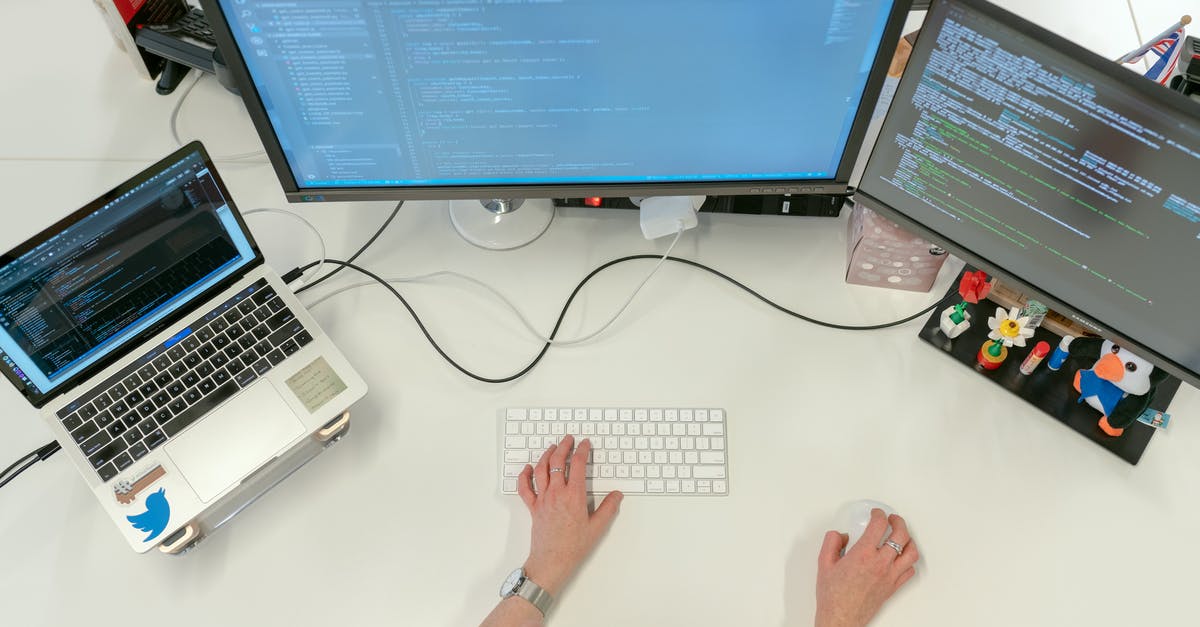 Code shared flights after BA / Aer Lingus merger - Female Software Engineer Coding on Computer Code shared flights after BA / Aer Lingus merger - Female Software Engineer Coding on Computer