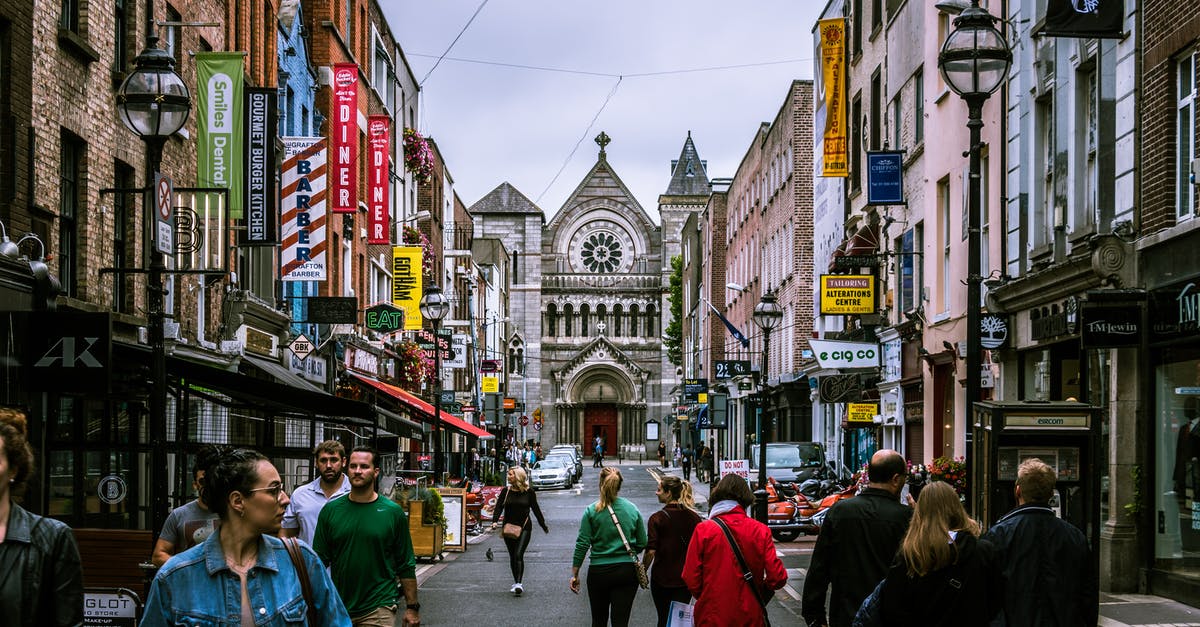 Colombian Citizen travel to Germany through Ireland (Dublin) - Photo of People Walking on Street Colombian Citizen travel to Germany through Ireland (Dublin) - Photo of People Walking on Street