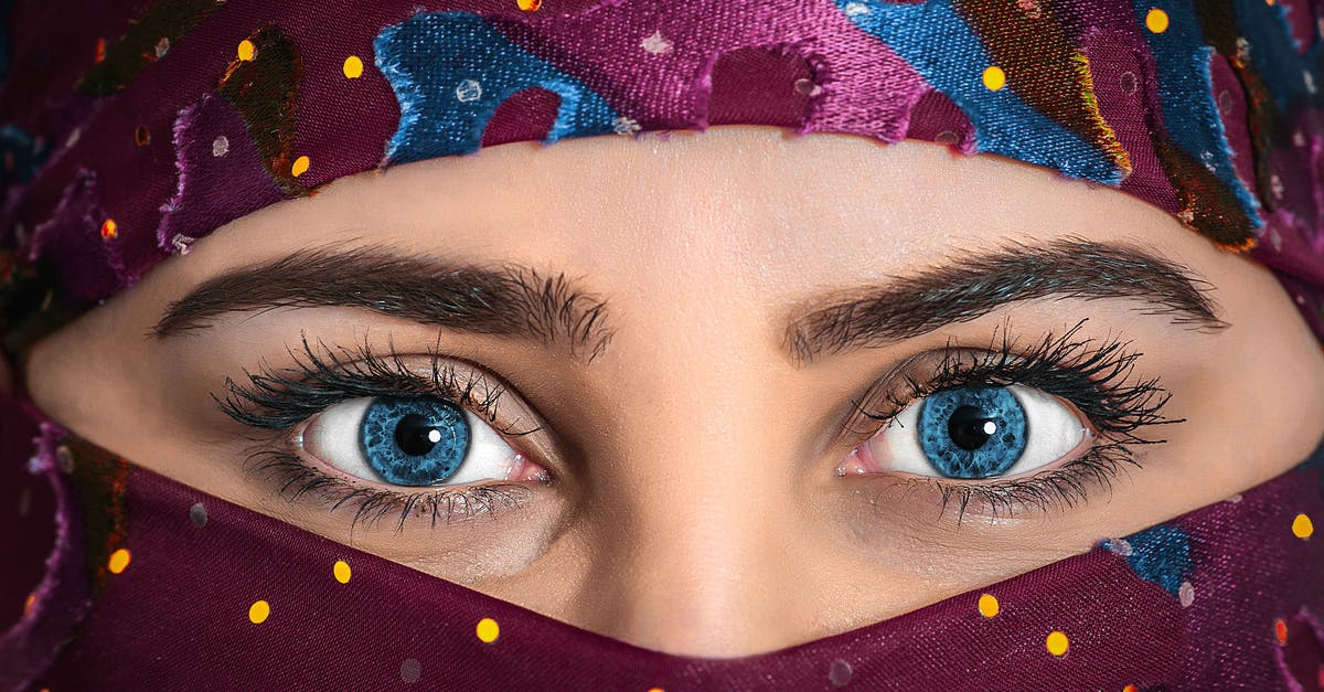 Color Printing in Luang Prabang - Woman With Blue Eyes Wearing Purple Hijab Scarf Color Printing in Luang Prabang - Woman With Blue Eyes Wearing Purple Hijab Scarf