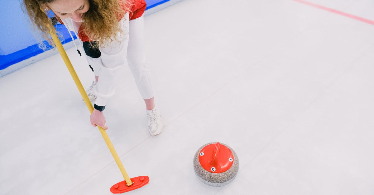 Connecting from ICE to regional trains (Deutsche Bahn) - Woman playing curling on ice sheet Connecting from ICE to regional trains (Deutsche Bahn) - Woman playing curling on ice sheet