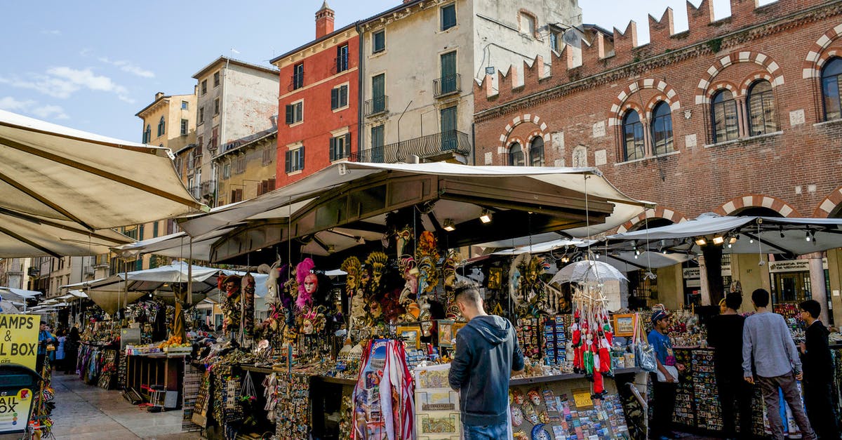 Converting tourist visa to working holiday visa [closed] - Group of People In A Street Market