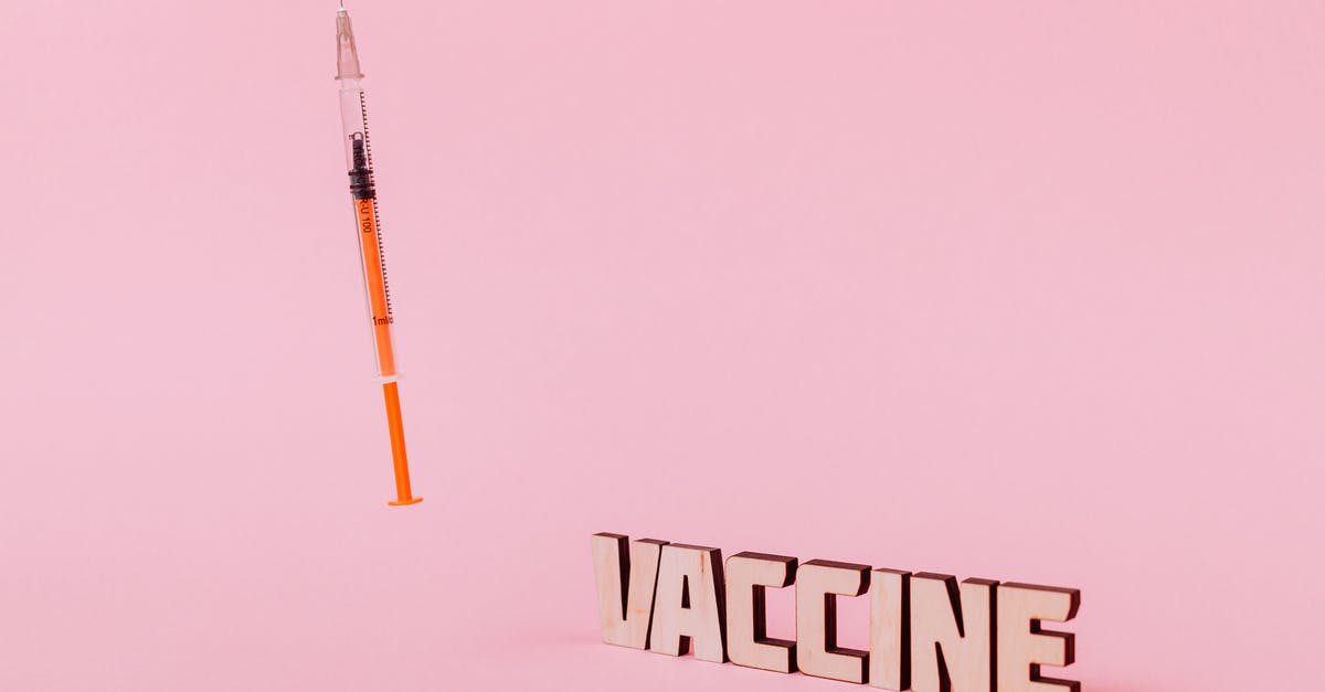 Costa Rican health insurance and tourist visa length - A Syringe and Vaccine Text on Pink Background Costa Rican health insurance and tourist visa length - A Syringe and Vaccine Text on Pink Background