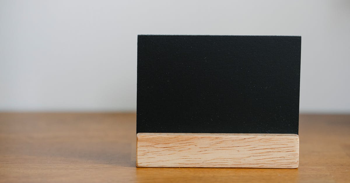 Credit card name mismatch because of long name - Name card on wooden table Credit card name mismatch because of long name - Name card on wooden table