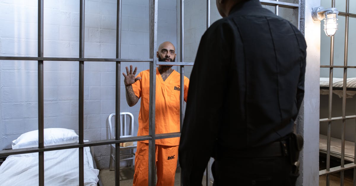Criminal conviction after B1/B2 visa - A Prisoner Talking to A Police Officer Criminal conviction after B1/B2 visa - A Prisoner Talking to A Police Officer