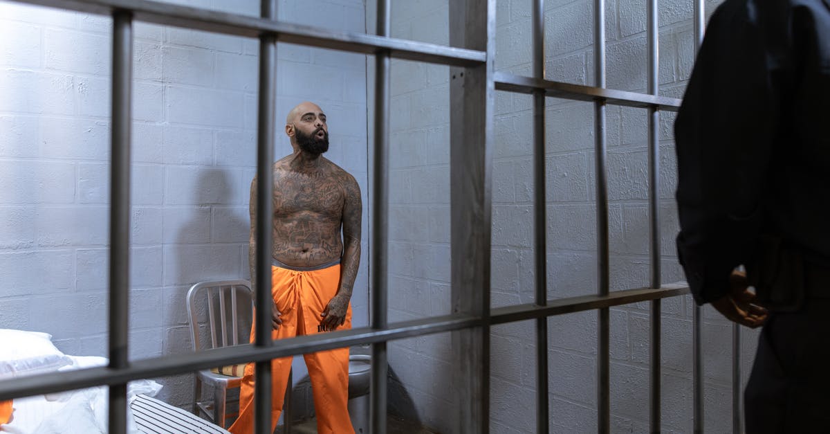 Criminal conviction after B1/B2 visa - A Shirtless Prisoner Full of Body Tattoos Criminal conviction after B1/B2 visa - A Shirtless Prisoner Full of Body Tattoos