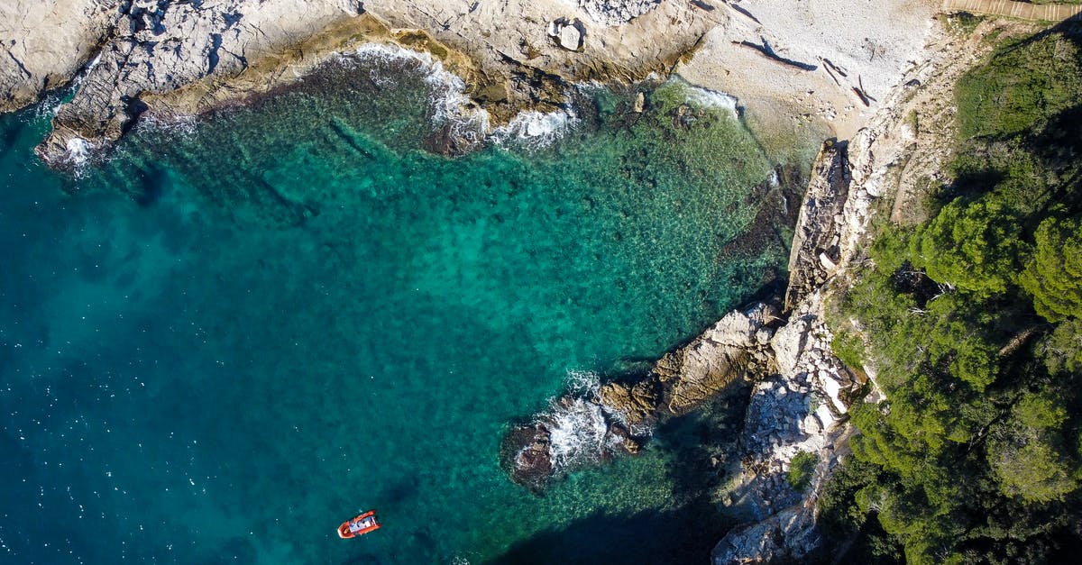 Croatia - Pula/Porec taxi prices - Drone Shot of a Seagull's Rocks in Croatia Croatia - Pula/Porec taxi prices - Drone Shot of a Seagull's Rocks in Croatia