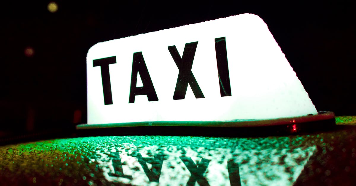 Croatia - Pula/Porec taxi prices - Wet Taxi Roof Light During Night Time Croatia - Pula/Porec taxi prices - Wet Taxi Roof Light During Night Time