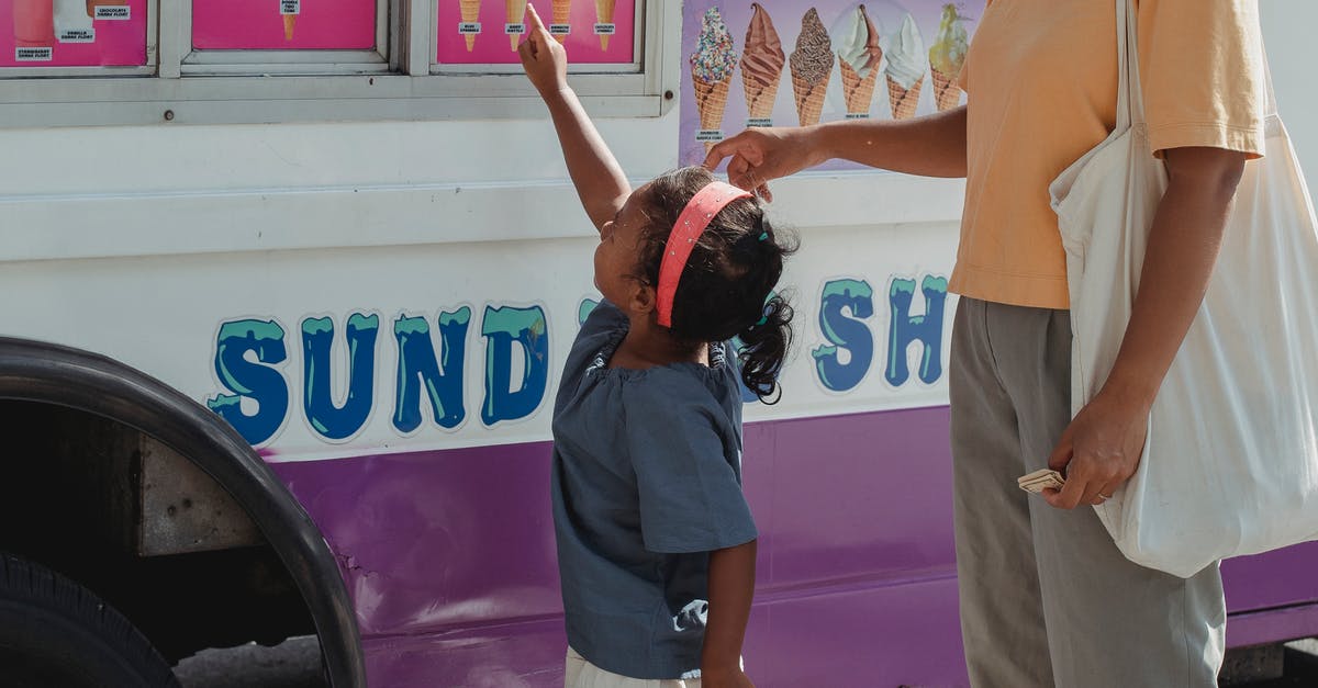 Crossing a border with an infant of a different citizenship - Asian girl asking for ice cream Crossing a border with an infant of a different citizenship - Asian girl asking for ice cream