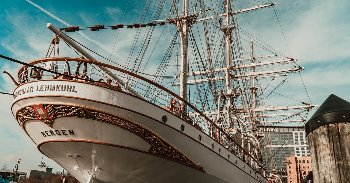 cruising with a Schengen visa from a British port - Modern white sailboat moored in harbor